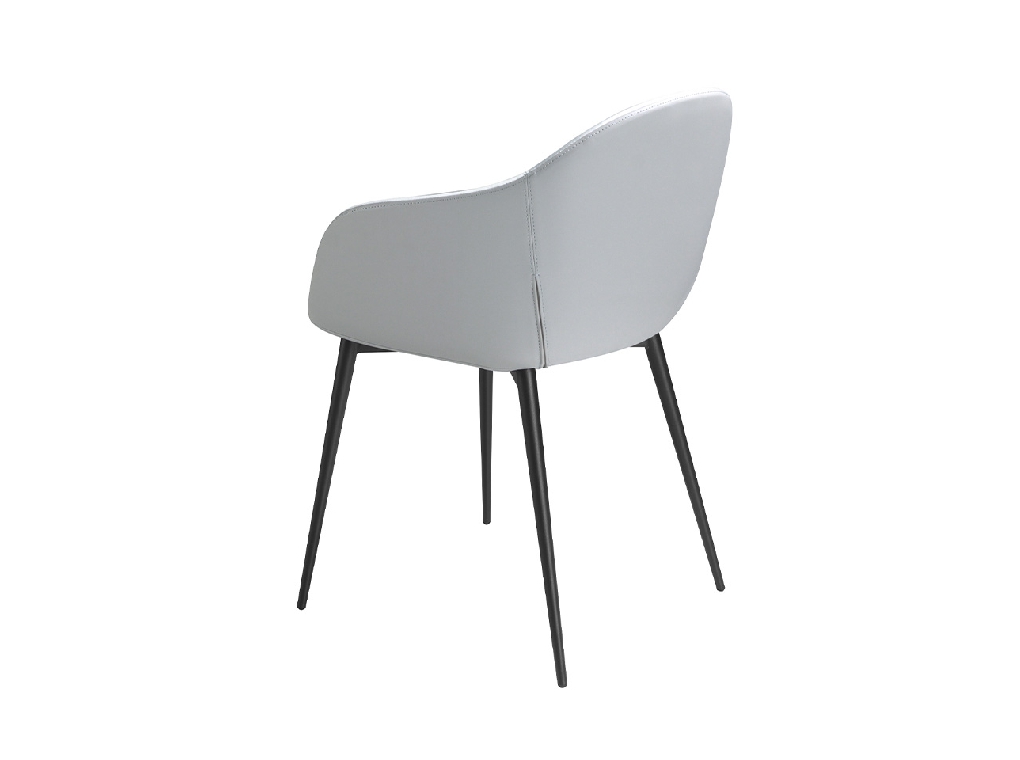 Chaise de salle à manger tapissée de velours et de cuir écologique. Structure en acier noir.