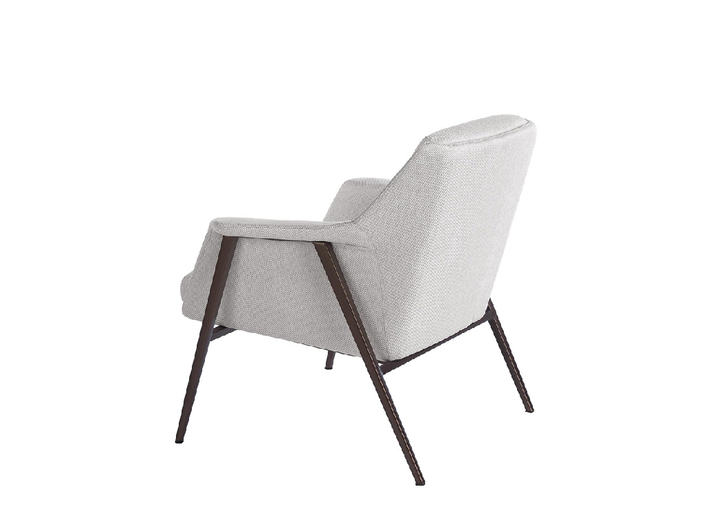 Armchair upholstered in fabric and brown steel legs