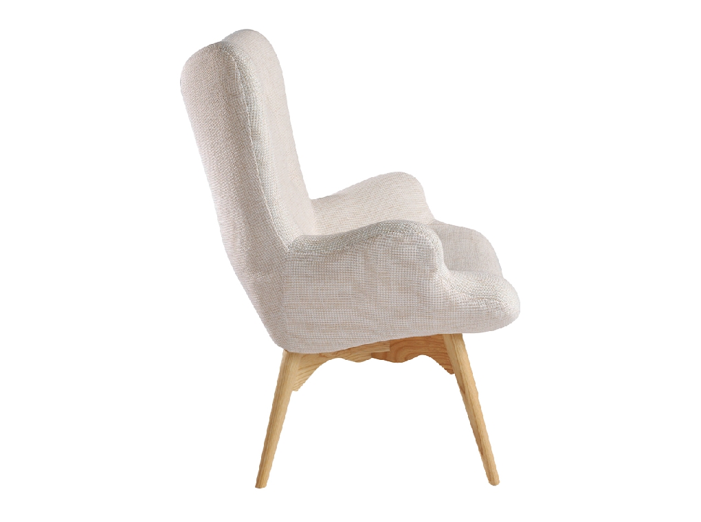 Armchair upholstered in tufted fabric