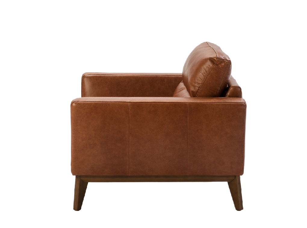 Armchair upholstered in leather and Walnut wood legs