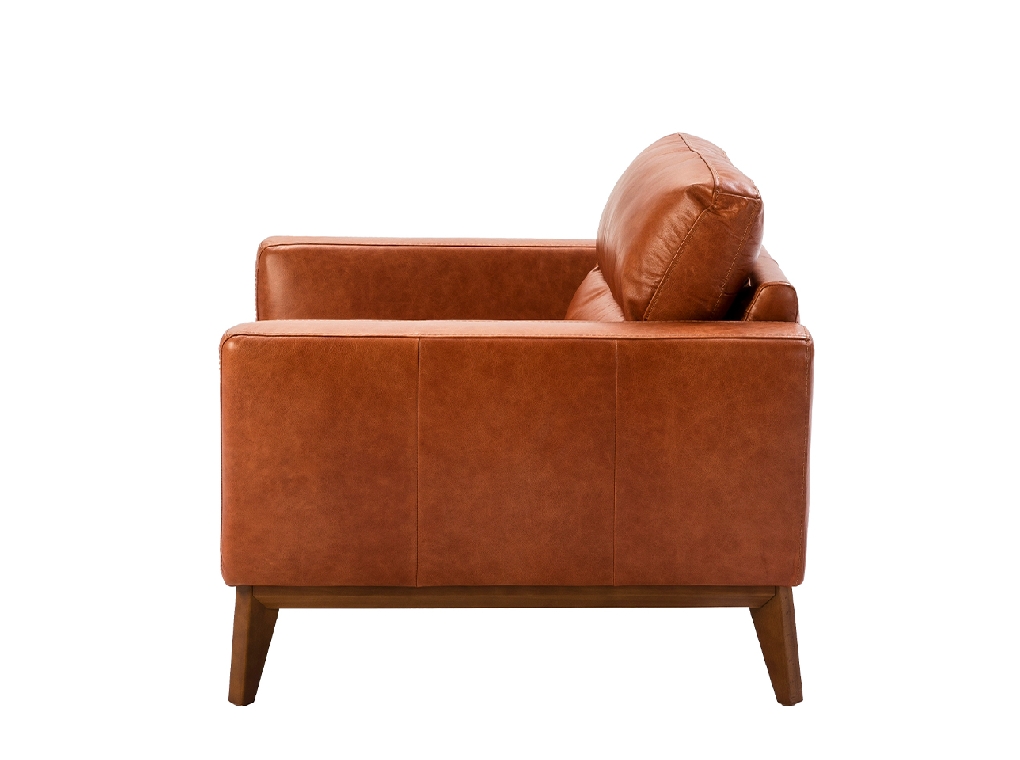 Armchair upholstered in leather and Walnut wood legs