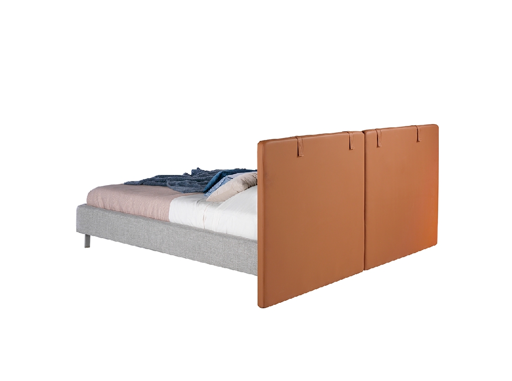 Bed upholstered in fabric and eco-leather with stainless steel legs