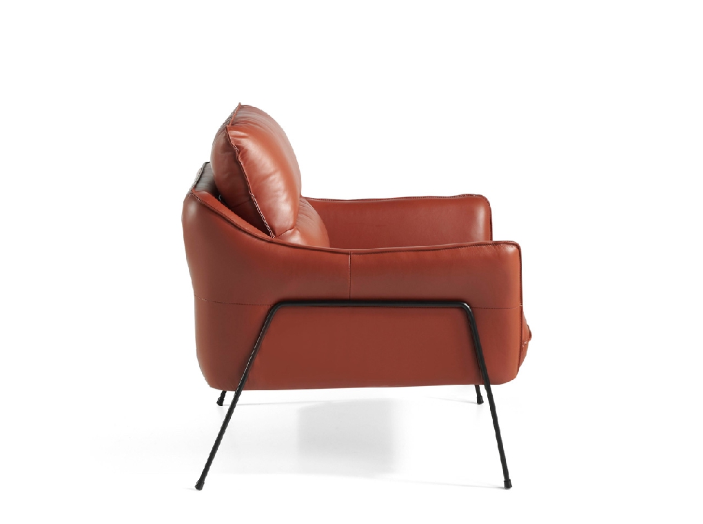 Armchair upholstered in leather and black steel legs Armchair upholstered in leather and black steel legs