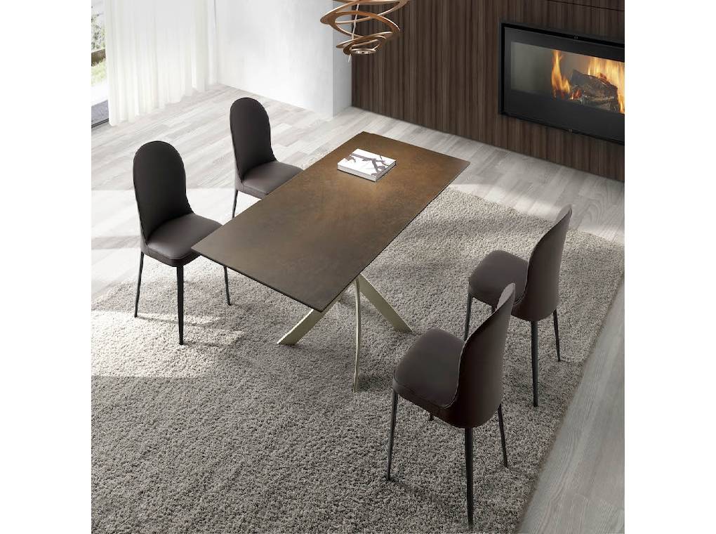 Chair upholstered in fabric with a steel structure. Chair upholstered in fabric with a steel structure.