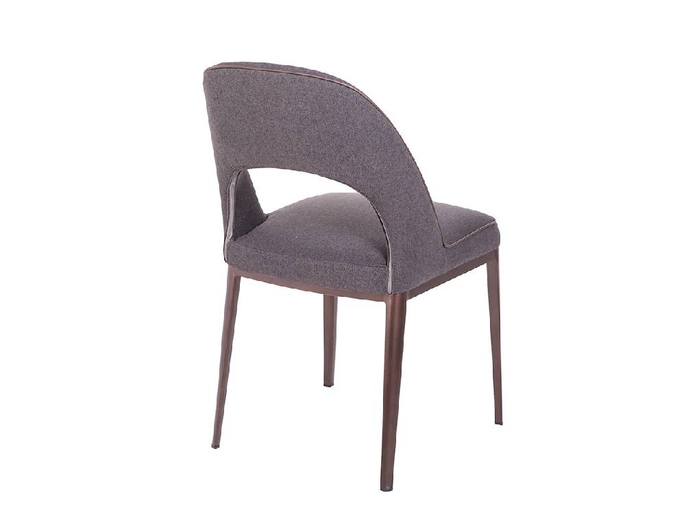 Chair upholstered in cloth with a steel structure. Chair upholstered in cloth with a steel structure.