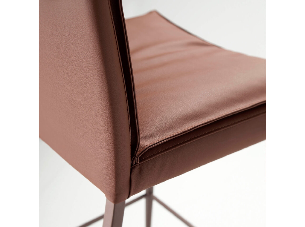 Stool upholstered in leatherette with legs in epoxy Stool upholstered in leatherette with legs in epoxy