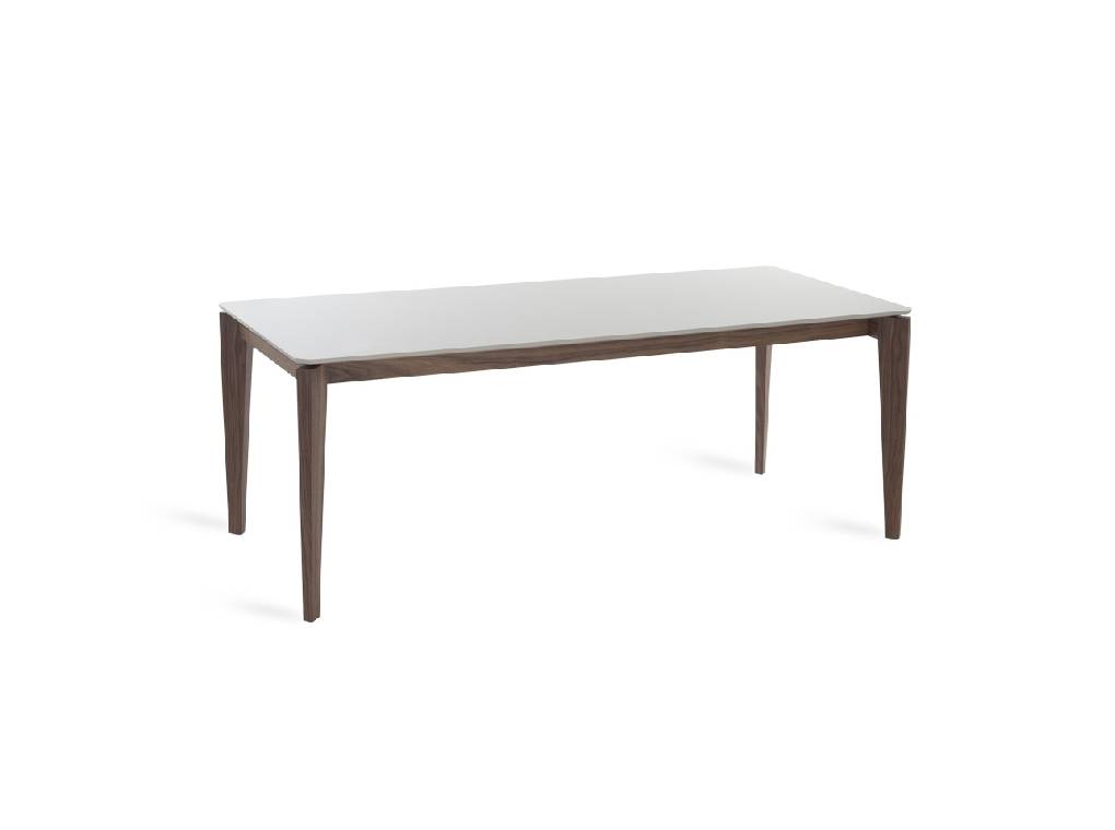 Dining table manufactured in wood with walnut plating Dining table manufactured in wood with walnut plating