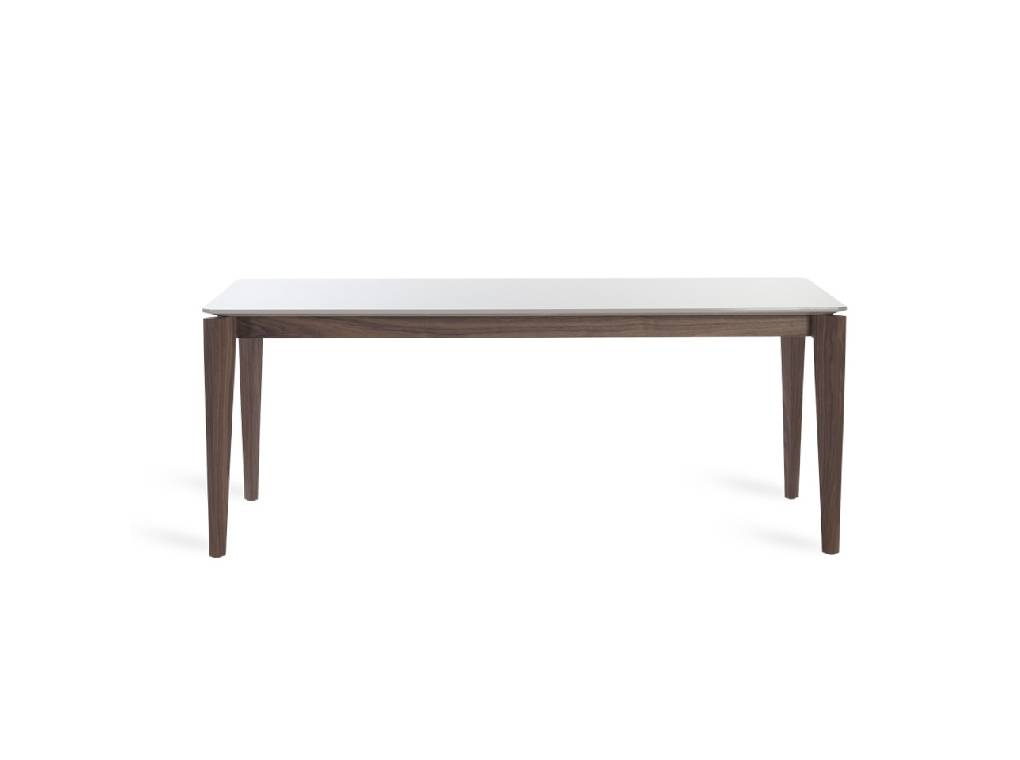 Dining table manufactured in wood with walnut plating Dining table manufactured in wood with walnut plating