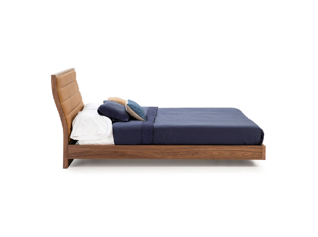 Bed upholstered in leatherette and Walnut wood Bed upholstered in leatherette and Walnut wood