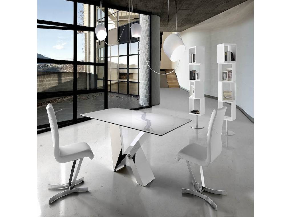 Dining table with ceramic marble top and stainless steel frame. Dining table with ceramic marble top and stainless steel frame.