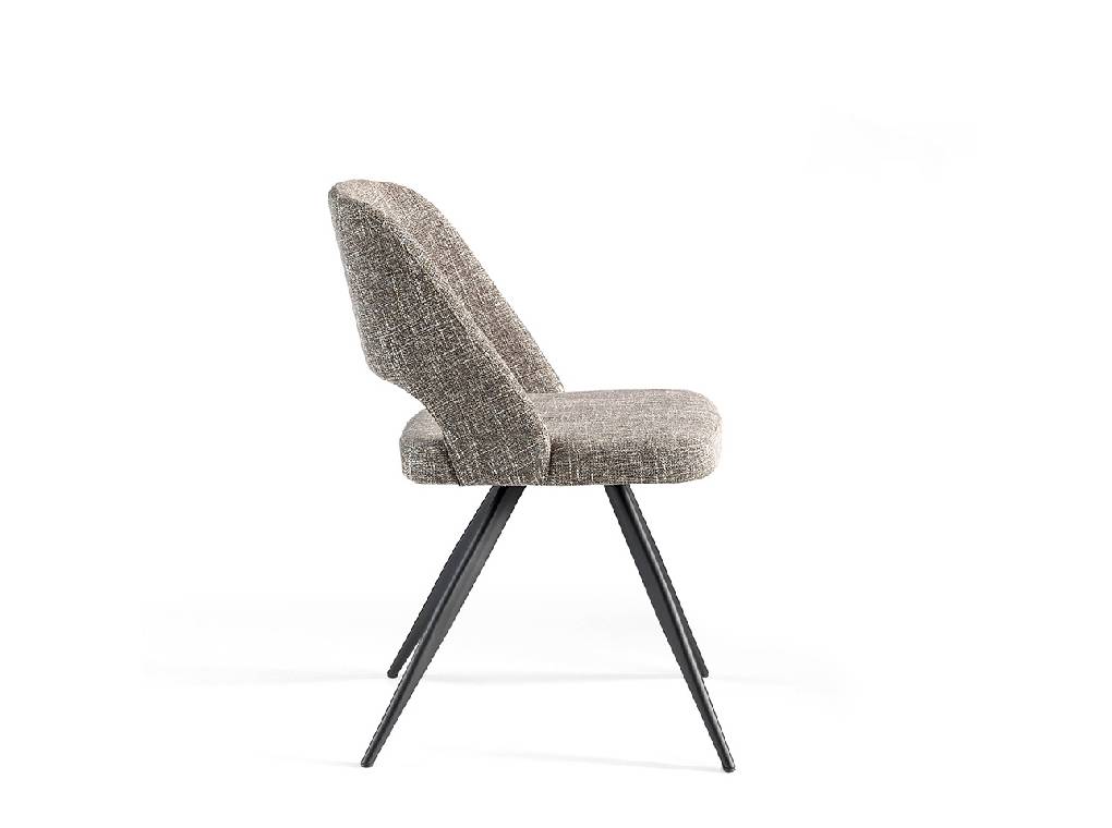 Chair upholstered in fabric with black steel legs