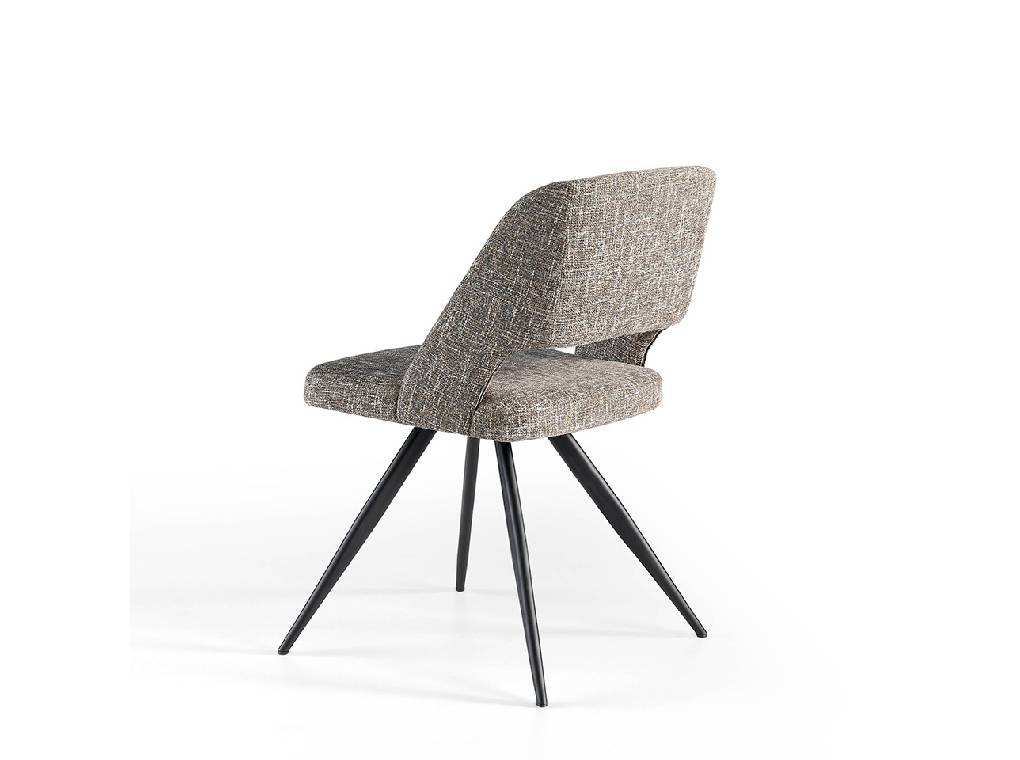 Chair upholstered in fabric with black steel legs