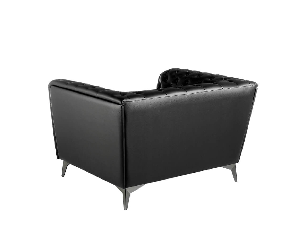 Armchair upholstered in leather with capitone effect Armchair upholstered in leather with capitone effect