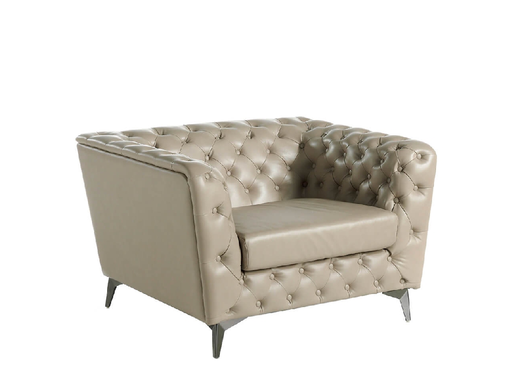 Armchair upholstered in leather witn capitone effect Armchair upholstered in leather witn capitone effect