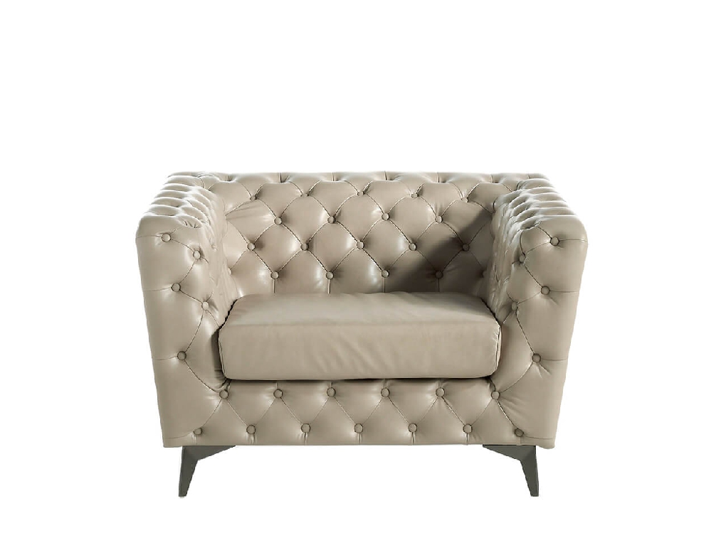 Armchair upholstered in leather witn capitone effect Armchair upholstered in leather witn capitone effect