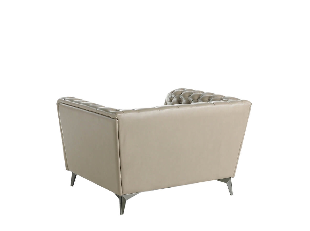 Armchair upholstered in leather witn capitone effect Armchair upholstered in leather witn capitone effect