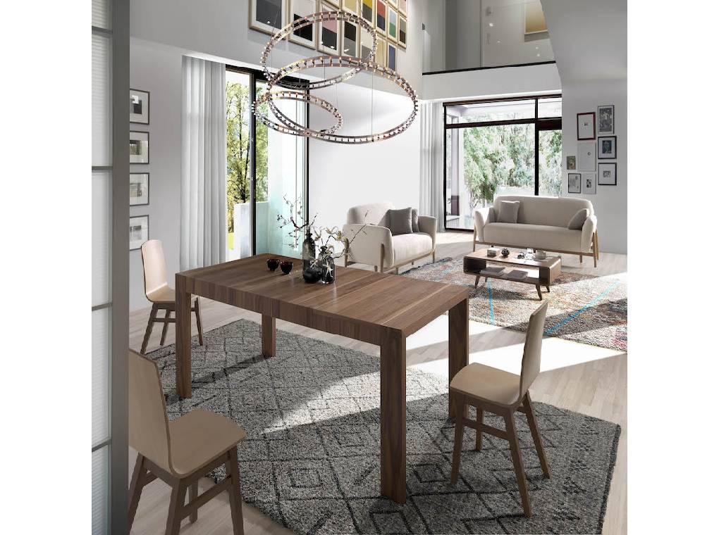 Extendable solid wood table with walnut wood veneer with two foldable extensions. Extendable solid wood table with walnut wood veneer with two foldable extensions.