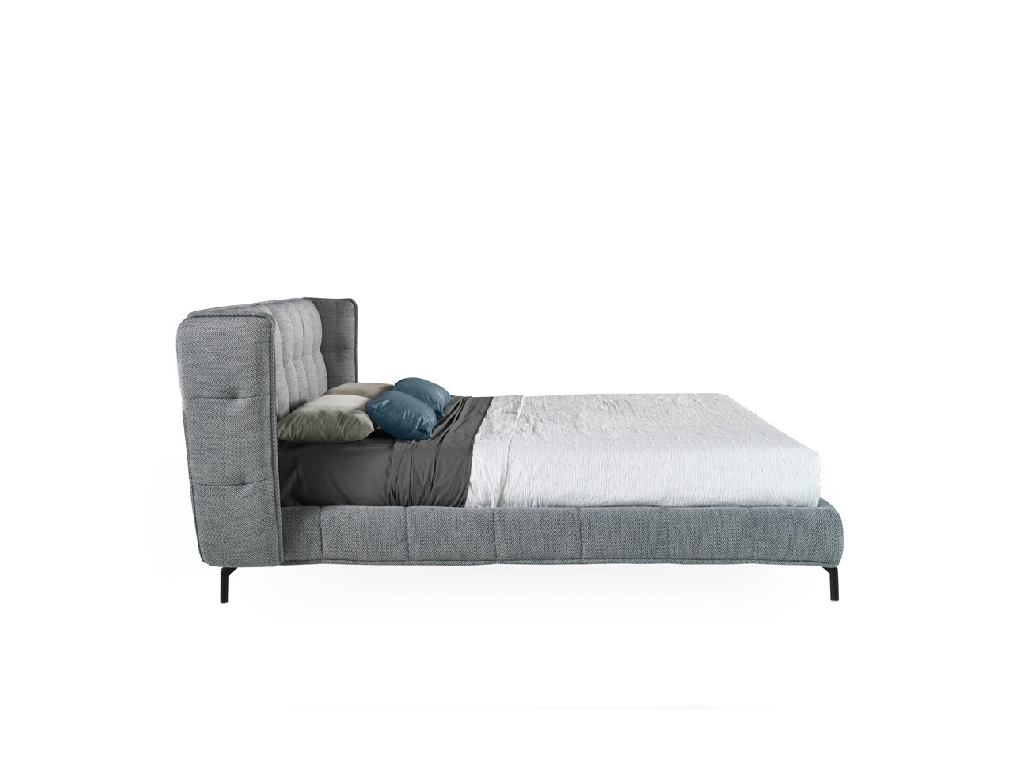 Bed upholstered in fabric with Walnut wood frame