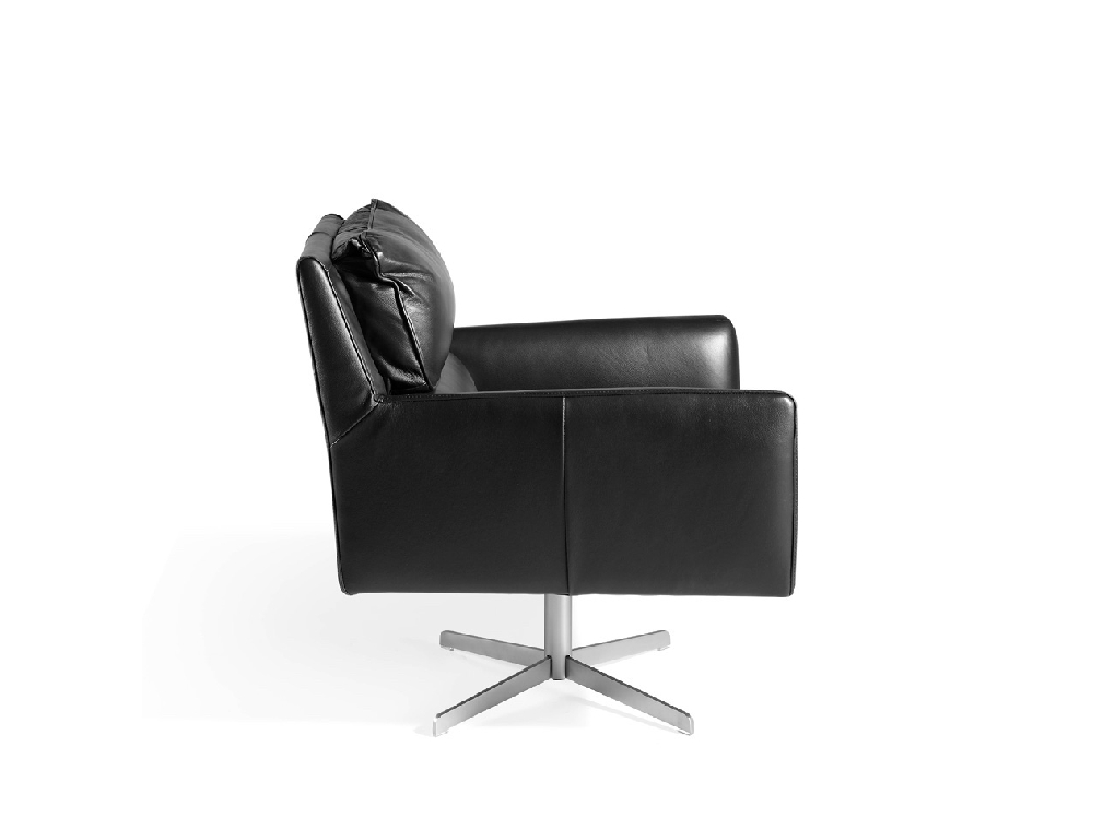 Swivel armchair upholstered in cowhide leather Swivel armchair upholstered in cowhide leather