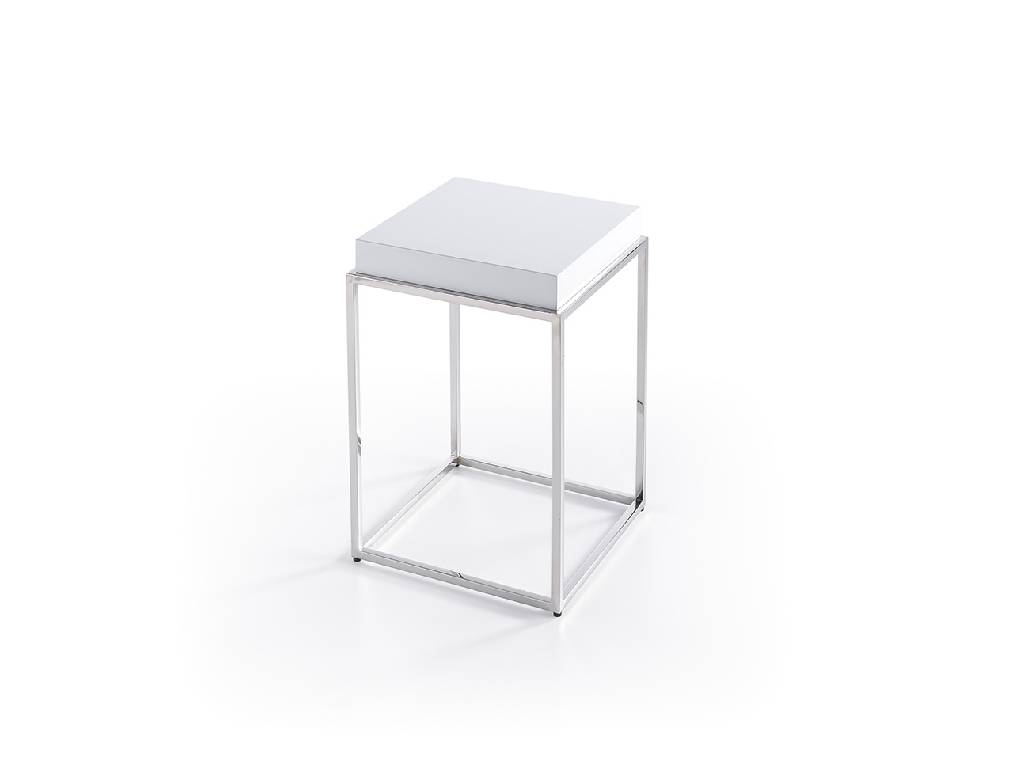 Corner table with stainless steel frame and laquered Mdf top. Corner table with stainless steel frame and laquered Mdf top.