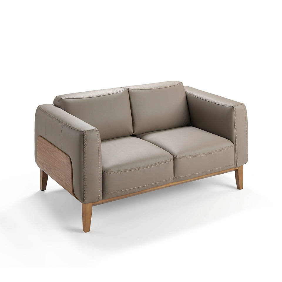 desesperación Oceanía elefante 2-seat sofa upholstered in leather with a walnut wood structure - Furniture  of design. Angel Cerdá